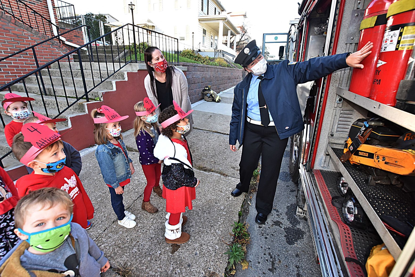 Firefighting instruction on fire engine tools and gear